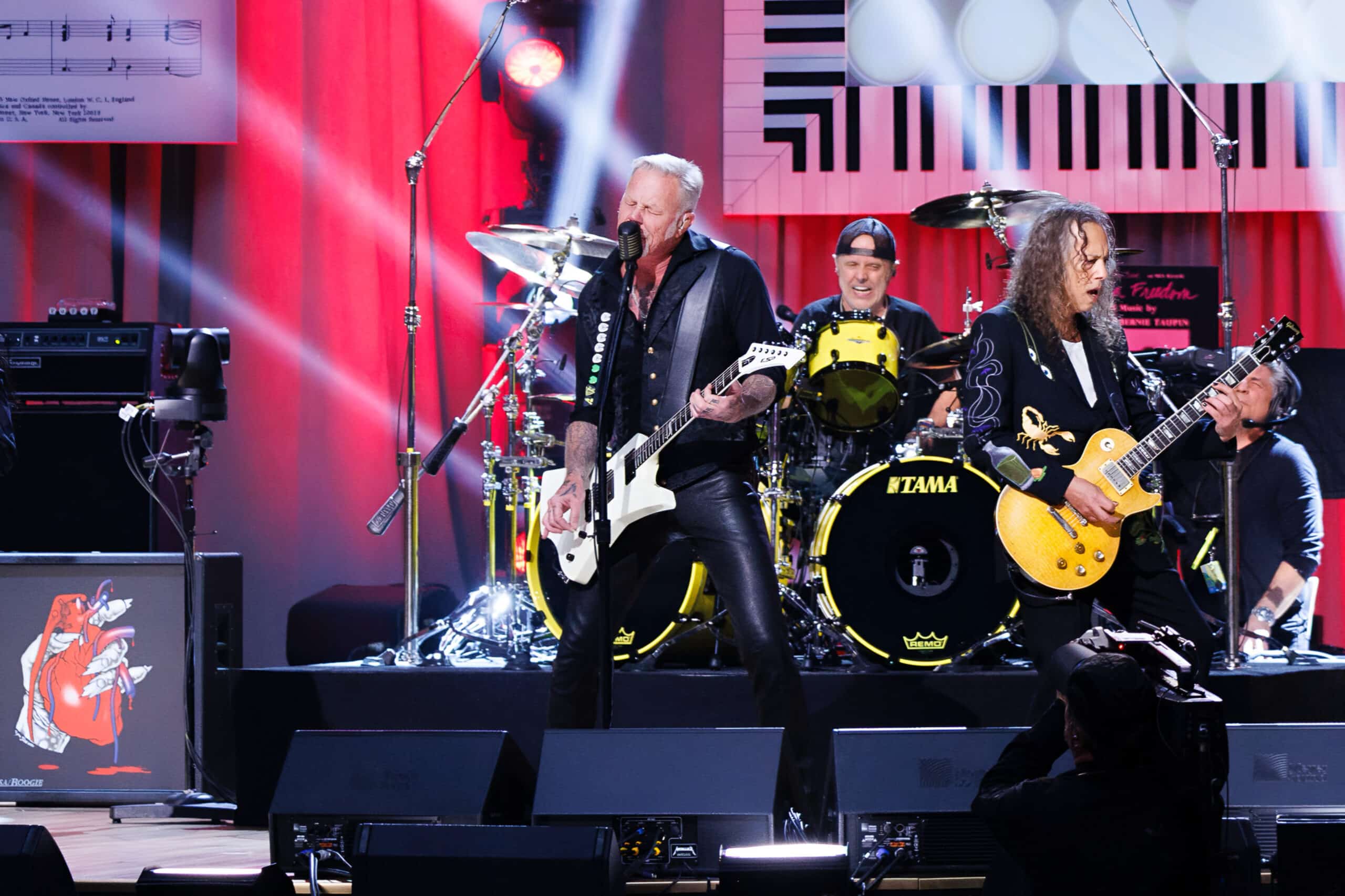 Metallica performing on stage, charity auction travel packages, vacation fundraising, travel fundraising, fundraising ideas, charity ideas, silent auction items, travel fundraising events