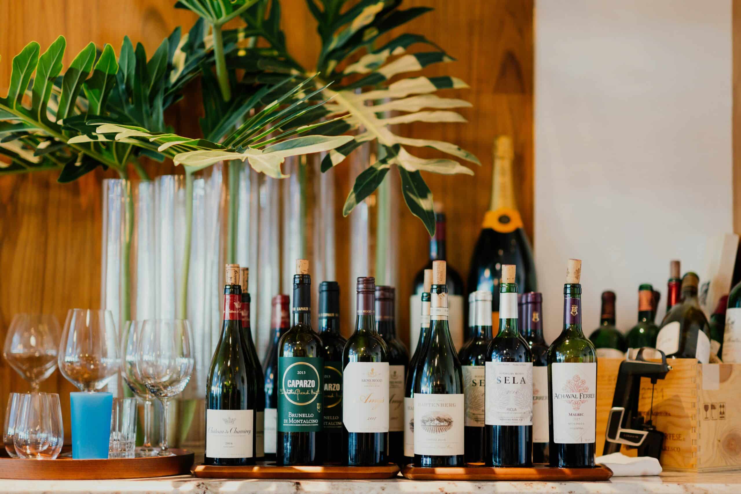 wine collection on table, vacation fundraising, fundraising ideas, charity ideas, silent auction items, travel fundraising events