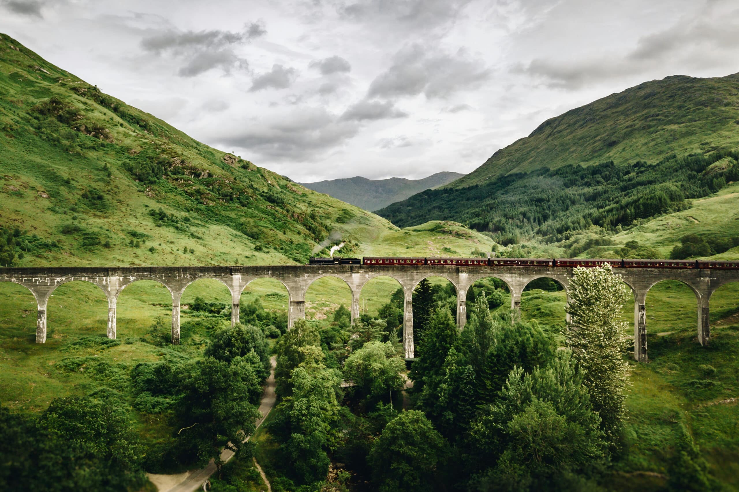 Harry Potter train on bridge, charity auction travel packages, vacation fundraising, travel fundraising, fundraising ideas, charity ideas, silent auction items, travel fundraising events