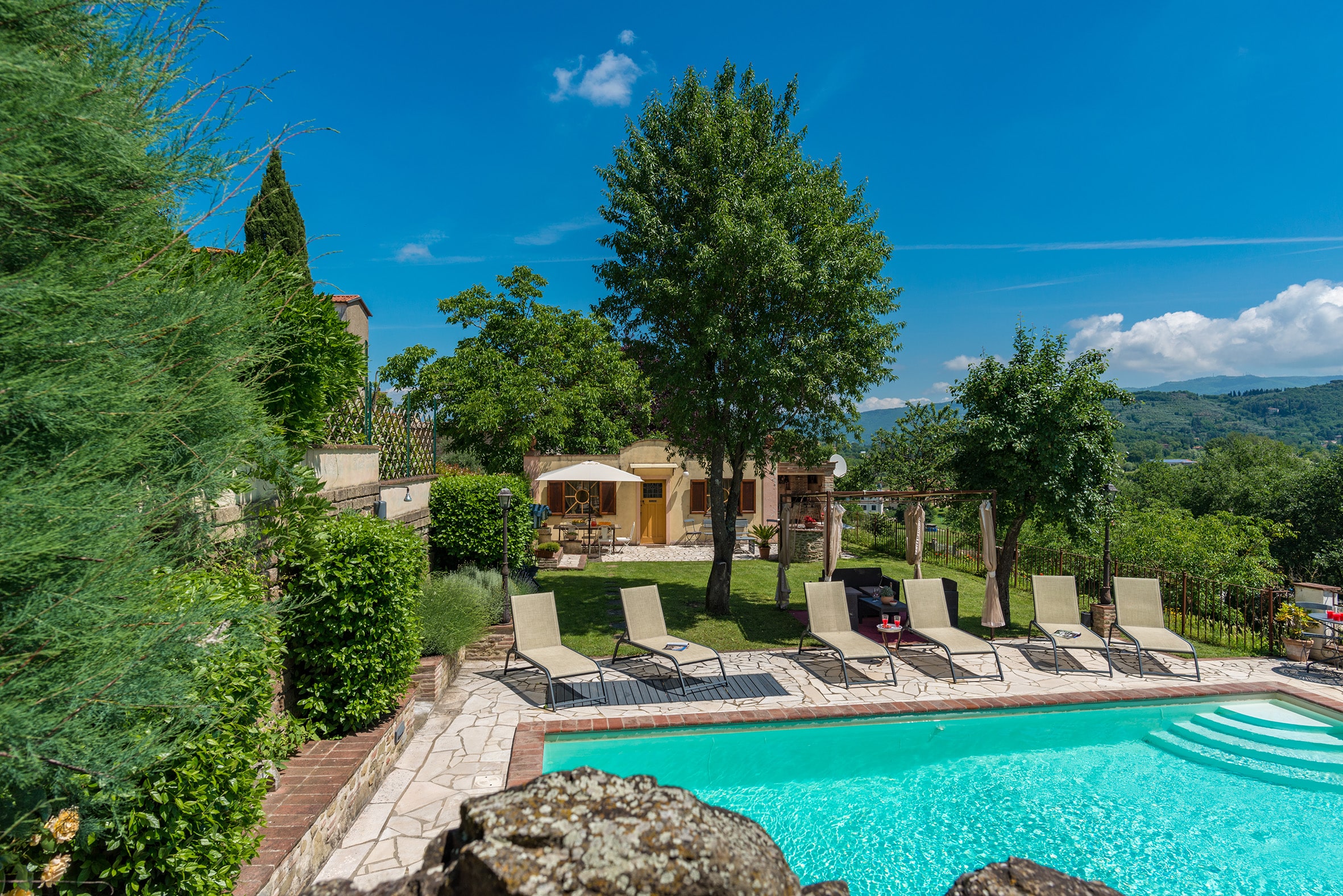 Pool view of Tuscany villa, charity auction travel packages, vacation fundraising, travel fundraising, auction packages for nonprofits, trips for fundraising, auction travel packages, auction vacation packages, auction packages