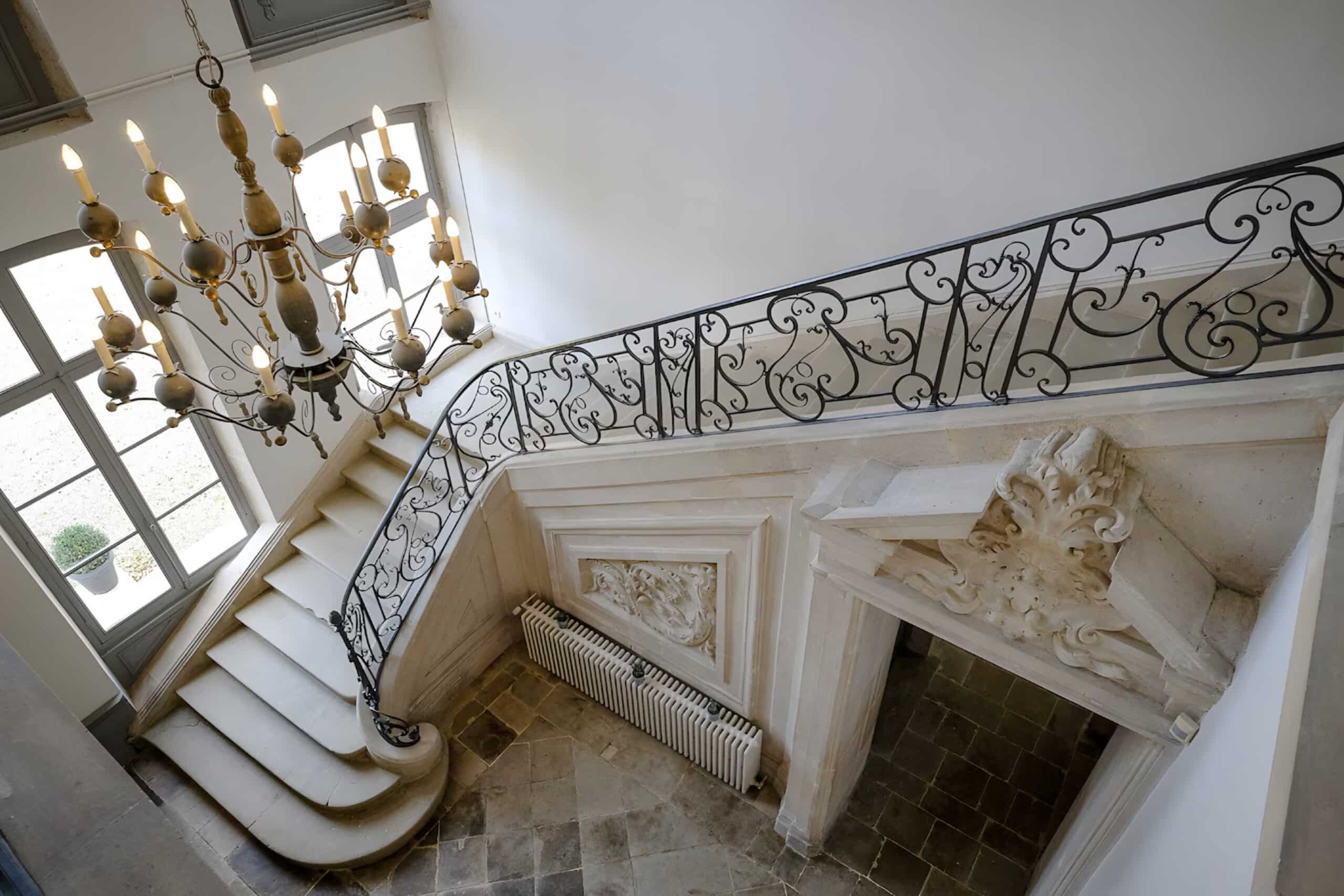 Champagne Chateau stairs, charity auction travel packages, vacation fundraising, travel fundraising, fundraising ideas, charity ideas, silent auction items, travel fundraising events