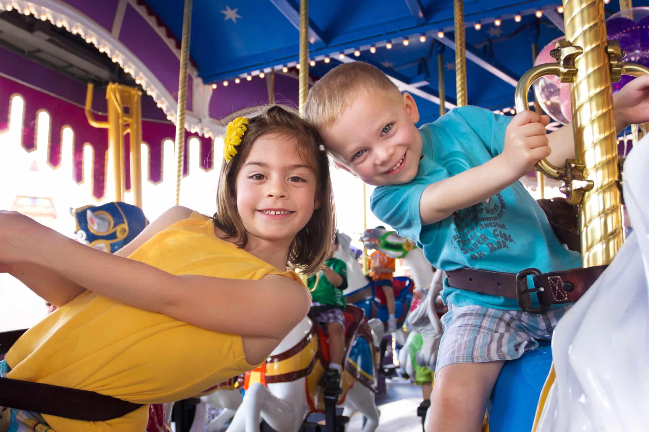 Kids on ride in Orlando, charity auction travel packages, vacation fundraising, travel fundraising, fundraising ideas, charity ideas, silent auction items, travel fundraising events