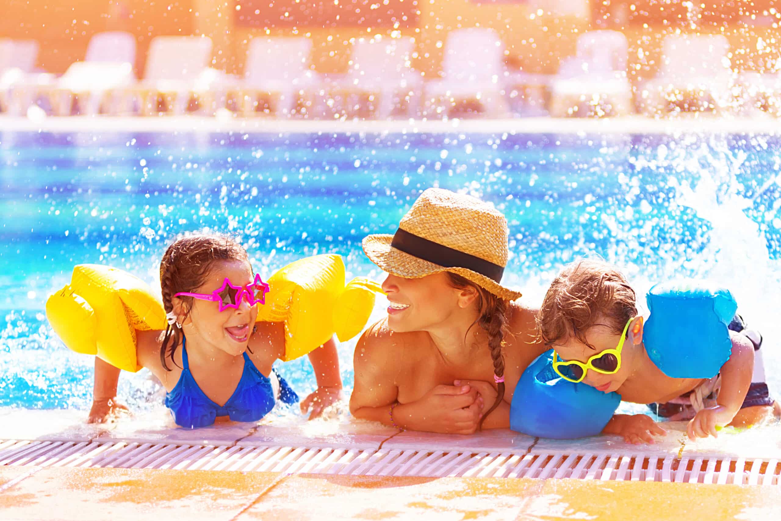 Mother and kids at pool in Orlando, charity auction travel packages, vacation fundraising, travel fundraising, fundraising ideas, charity ideas, silent auction items, travel fundraising events