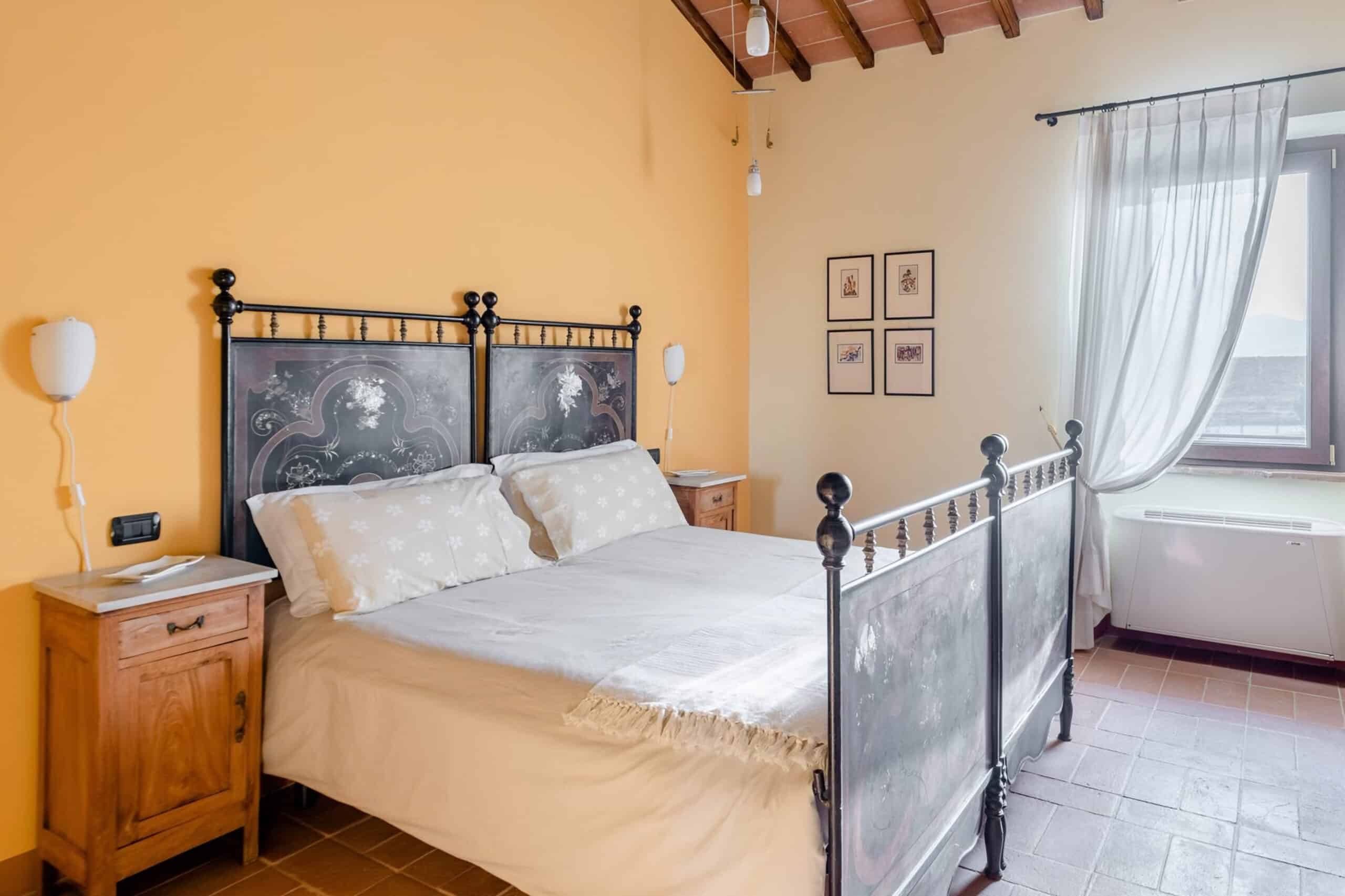 bedroom in Umbrian villa, charity auction travel packages, vacation fundraising, travel fundraising, fundraising ideas, charity ideas, silent auction items, travel fundraising events