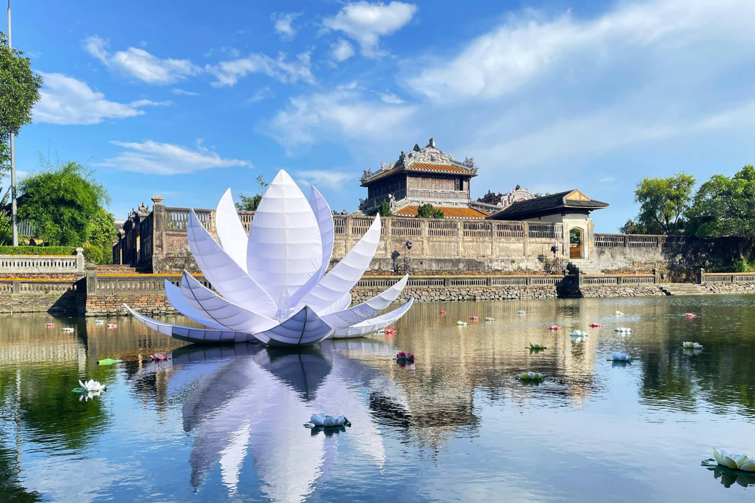 Vietnam flower statue in pond, charity auction travel packages, vacation fundraising, travel fundraising, fundraising ideas, charity ideas, silent auction items, travel fundraising events