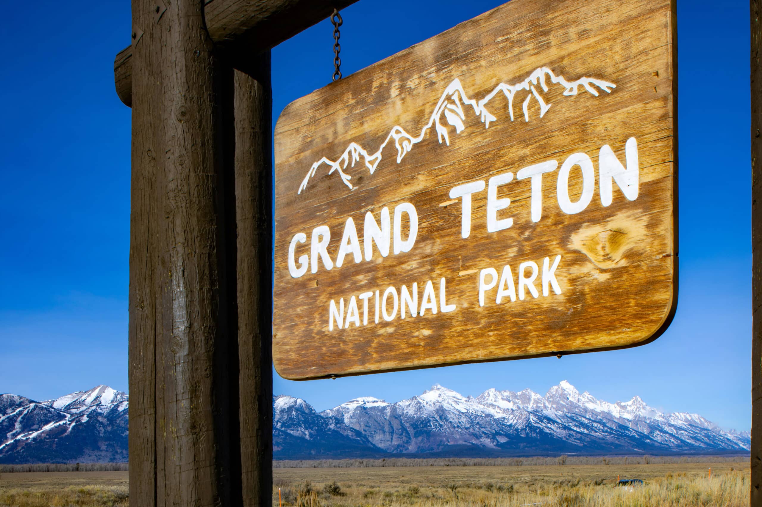 Grand Teton National Park sign, charity auction travel packages, vacation fundraising, travel fundraising, fundraising ideas, charity ideas, silent auction items, travel fundraising events