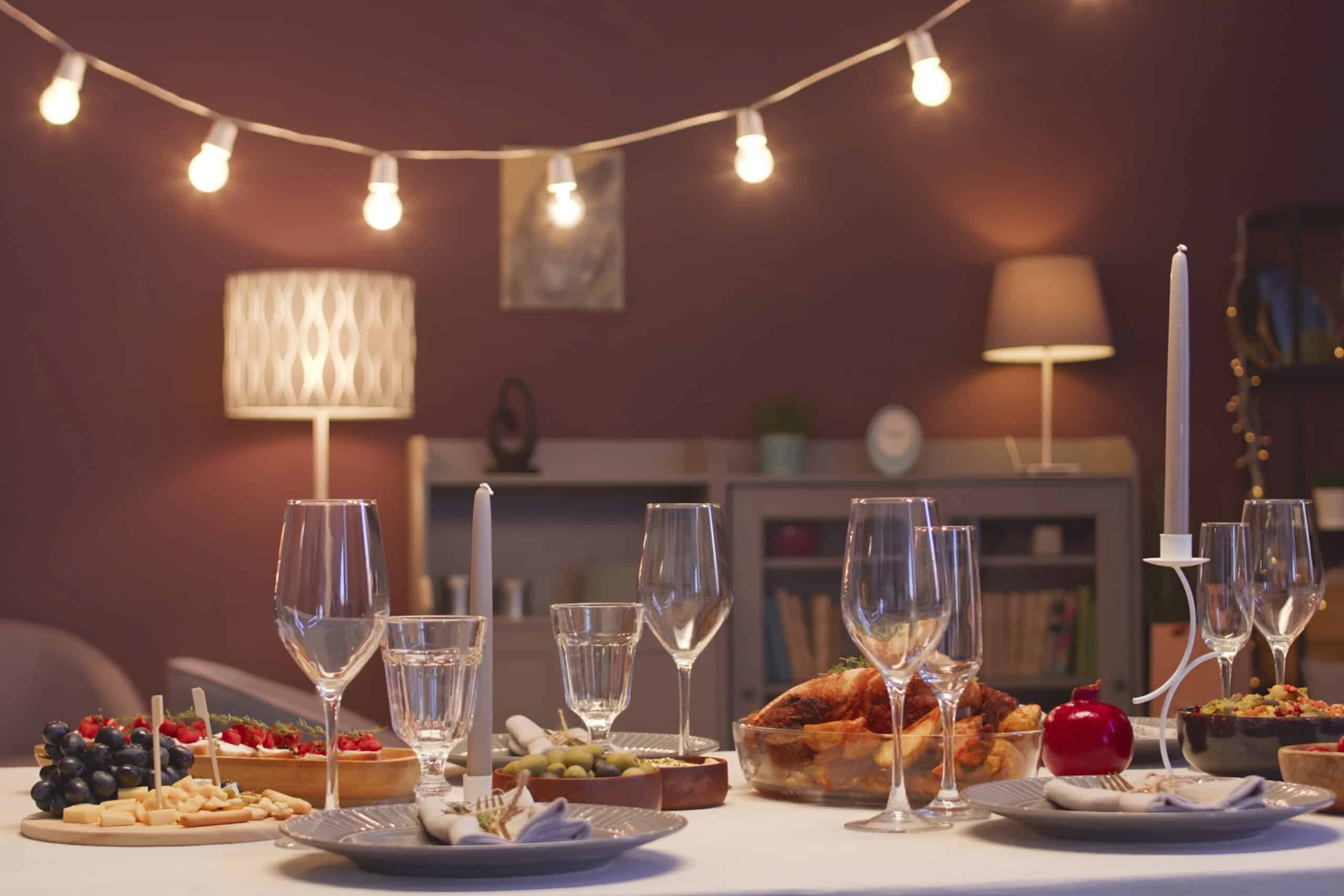 dinner table with food and wine glasses, charity auction travel packages, vacation fundraising, travel fundraising, fundraising ideas, charity ideas, silent auction items, travel fundraising events